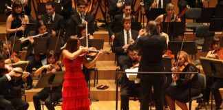 Concierto solidario de la WUOch en el Palau de la Música de Valencia